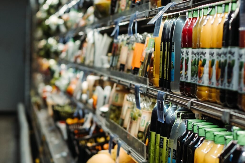 Grocery store shelves with price labels