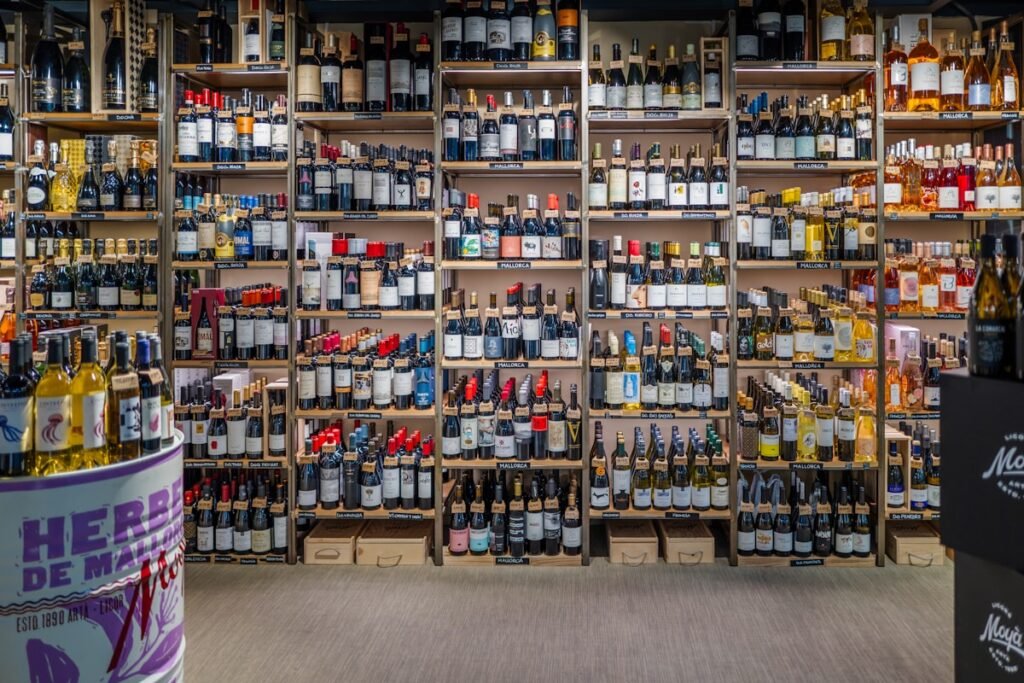 Shelves filled with wine bottles in a retail store