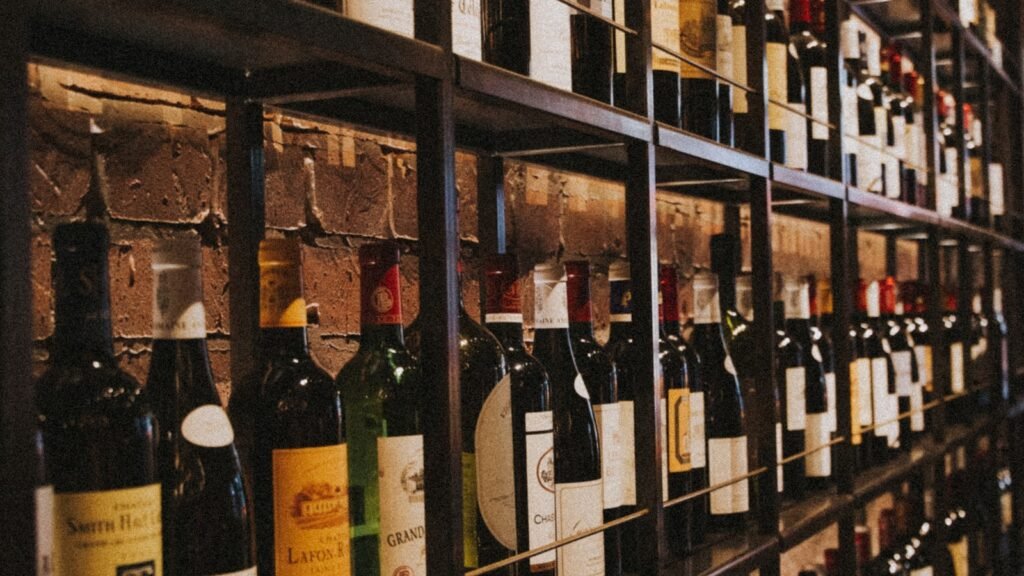 Wine bottles displayed on shelves in a retail store